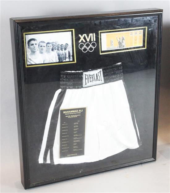 Muhammed Ali. A pair of signed boxing trunks from the 1960 USA Olympics, overall 3ft 2in. x 2ft 10in.